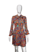 Load image into Gallery viewer, Colorful floral dress on a mannequin against a white background
