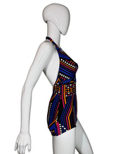 Load image into Gallery viewer, Multicolored geometric patterned swimsuit on a mannequin against a white background