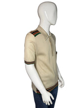 Load image into Gallery viewer, Beige sweater with striped sleeves on a mannequin against a white background
