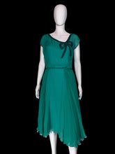 Load image into Gallery viewer, A teal Helen Rose midi dress with a ribbon detail at the collar displayed on a white mannequin.