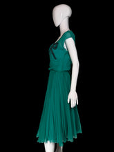 Load image into Gallery viewer, A teal Helen Rose midi dress with a ribbon detail at the collar displayed on a white mannequin.