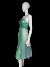 Load image into Gallery viewer, A two-tone green sheer mesh nightgown with a lace bodice and thin spaghetti straps, displayed on a white mannequin.