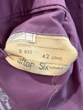 Load image into Gallery viewer, Close-up of a purple garment's inner collar showing a sewn-in size and fit label that reads 'S 610', '42 LONG', and 'after Six FORMALS'.