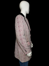 Load image into Gallery viewer, A men's suit jacket featuring a dusty pink and red floral pattern with black velvet lapels and black buttons.