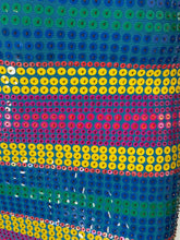 Load image into Gallery viewer, Close-up of a sequined fabric featuring horizontal stripes of green, blue, yellow, pink, and red sequins on a turquoise background.
