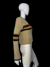 Load image into Gallery viewer, A cropped knit sweater displayed on a white mannequin. The sweater is beige with horizontal stripes in green, orange, and black.