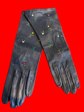Load image into Gallery viewer, A pair of black leather gloves with colorful embroidered floral details.