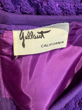 Load image into Gallery viewer, Close-up of a purple garment interior with a satin label reading Gallant California, showing textured purple fabric and shiny purple lining.