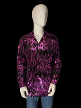 Load image into Gallery viewer, 1990s black long sleeve metallic button up with purple flames shown on a white mannequin.