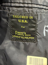 Load image into Gallery viewer, Close-up of a black garment interior label reading 'TAILORED IN U.SA'