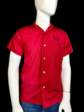 Load image into Gallery viewer, Red short-sleeve shirt with 'Troy' logo on a mannequin against a gray background