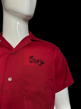 Load image into Gallery viewer, Red shirt with 'Troy' embroidery on a white mannequin