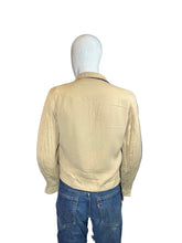 Load image into Gallery viewer, Mannequin wearing a beige jacket and blue jeans on a white background