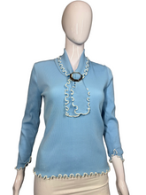 Load image into Gallery viewer, Mannequin wearing a blue ribbed top with decorative trim against a neutral background