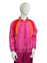 Load image into Gallery viewer, Mannequin wearing a colorful jacket and pants set against a plain background
