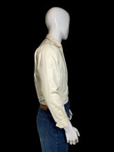 Load image into Gallery viewer, A cream-colored long-sleeve jacket displayed on a white mannequin torso, shown from a side profile.