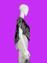 Load image into Gallery viewer, A white mannequin torso wearing a black and silver sequined sleeveless top or dress overlay