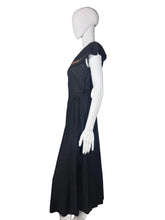 Load image into Gallery viewer, Black dress on a mannequin against a plain background