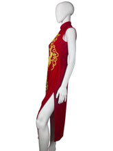 Load image into Gallery viewer, Red velvet dress with yellow Phoenix design on a mannequin against a neutral background