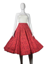 Load image into Gallery viewer, Mannequin wearing a red patterned skirt.