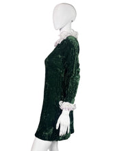 Load image into Gallery viewer, Green velvet dress on a mannequin.
