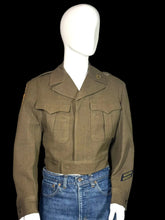 Load image into Gallery viewer, Green WWII army jacket and blue jeans on a mannequin against a plain background