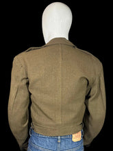 Load image into Gallery viewer, Green WWII army jacket and blue jeans on a mannequin against a plain background
