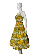 Load image into Gallery viewer, Mannequin wearing a yellow floral dress on a white background