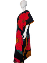 Load image into Gallery viewer, Mannequin wearing a colorful floral dress against a white wall.