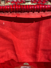 Load image into Gallery viewer, Close-up of a red lining detached from outer shell