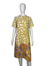 Load image into Gallery viewer, Yellow and white patterned dress on a mannequin
