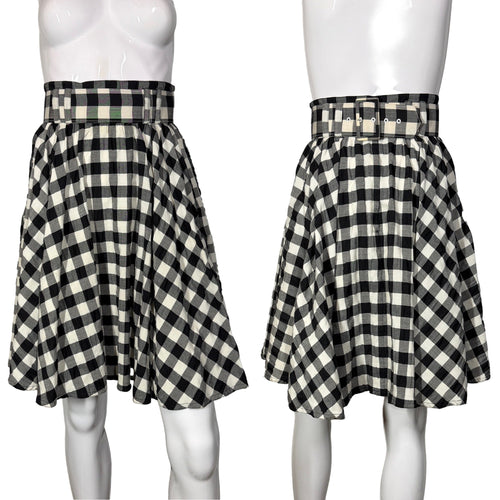Black and white checkered skirt on a mannequin against a plain background