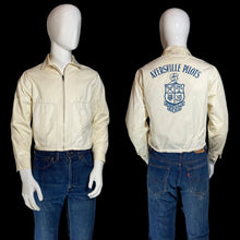 Load image into Gallery viewer, A cream-colored zip-up jacket displayed on a white mannequin torso.
