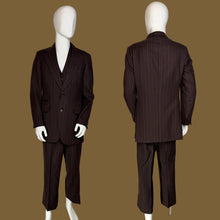 Load image into Gallery viewer, A dark brown pinstripe suit displayed on two white mannequins, showing both the front and back views.
