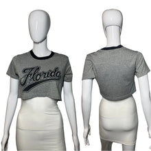 Load image into Gallery viewer, Gray t-shirt with &#39;Florida&#39; print on a mannequin against a plain background

