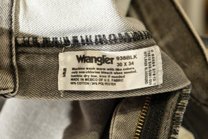 Wrangler label on a piece of clothing with visible text.
