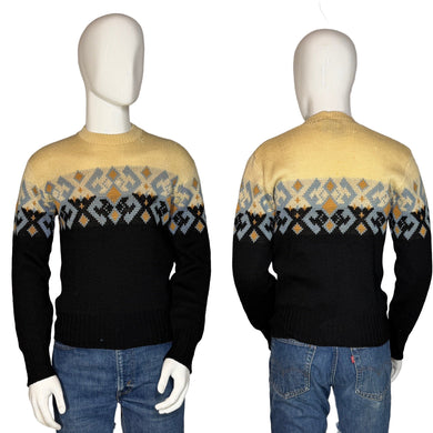 Black sweater with geometric pattern worn by a mannequin on a plain background