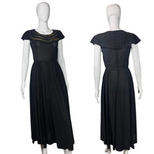 Load image into Gallery viewer, Black dress on a mannequin against a plain background
