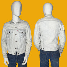 Load image into Gallery viewer, A light-wash denim jacket displayed on a white mannequin, shown from both the front and back views.
