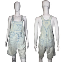 Load image into Gallery viewer, Light blue denim overalls on a mannequin against a white background
