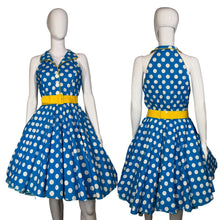Load image into Gallery viewer, Blue polka dot dress with a yellow belt on a mannequin against a neutral background
