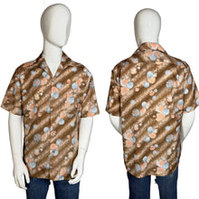 Load image into Gallery viewer, Mannequin wearing a patterned shirt on a plain background
