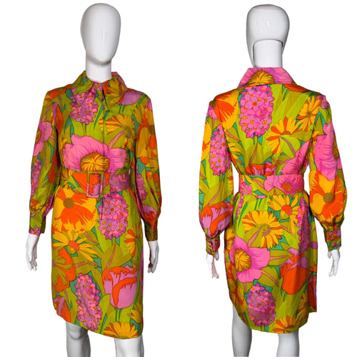 Colorful floral dress on a mannequin against a plain background