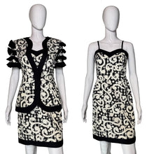 Load image into Gallery viewer, Black and white dress with and without matching coat.
