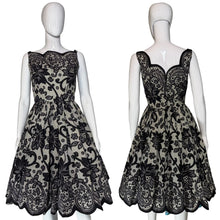 Load image into Gallery viewer, Black lace dress on a mannequin
