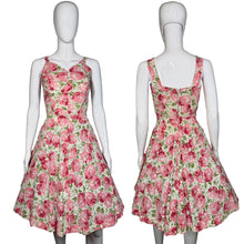 Load image into Gallery viewer, Floral dress on a mannequin against a neutral background

