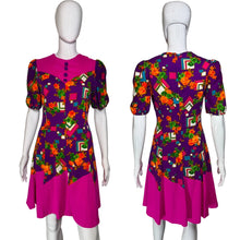 Load image into Gallery viewer, Colorful dress with floral and geometric pattern on a mannequin 
