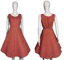 Load image into Gallery viewer, Red patterned dress on a mannequin against a plain background
