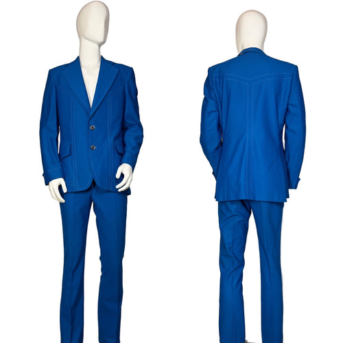 Blue suit on a mannequin against a plain wall