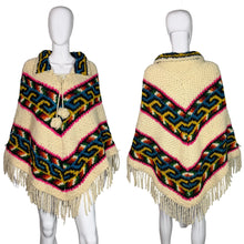 Load image into Gallery viewer, Colorful knitted poncho with patterns on a mannequin against a white background
